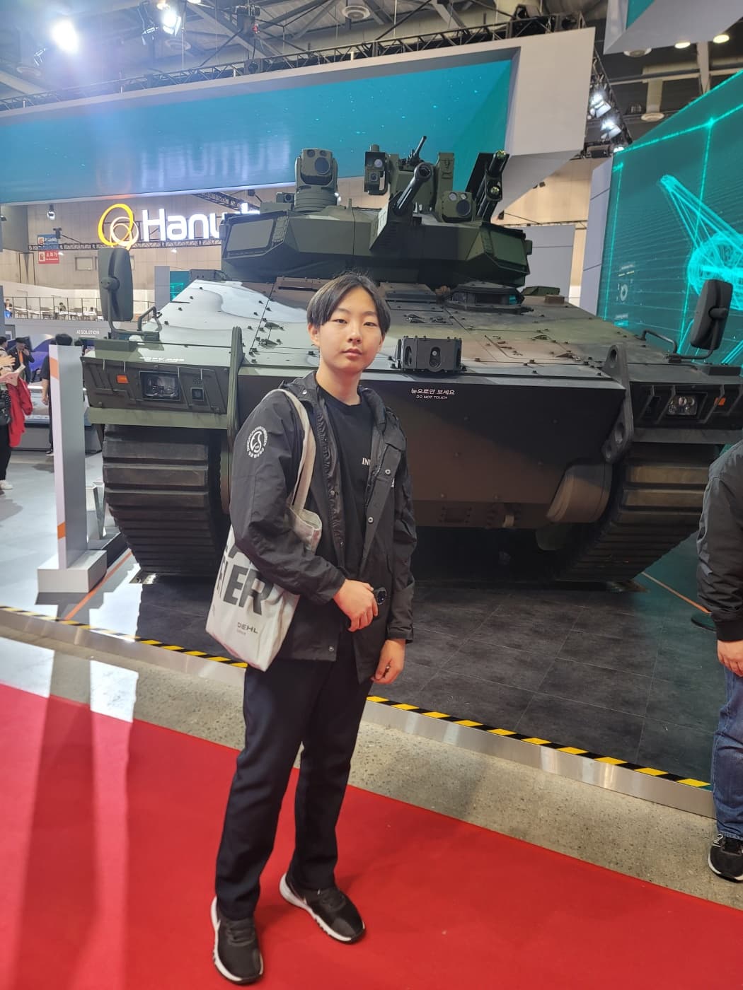 At a defense technology exhibit