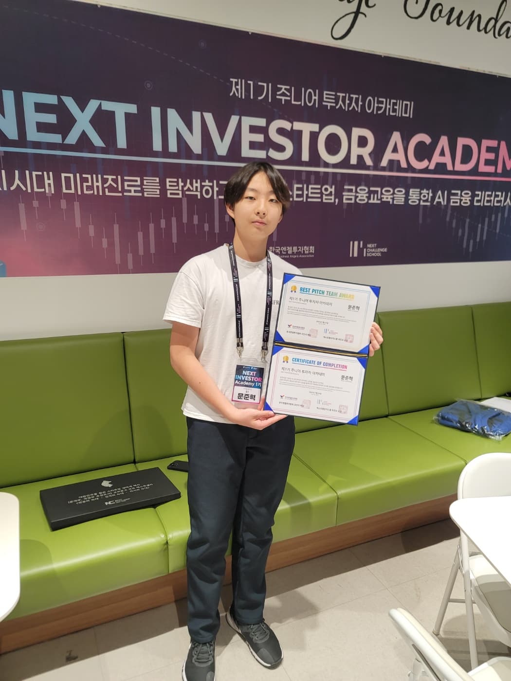 Holding certificates from the Next Investor Academy